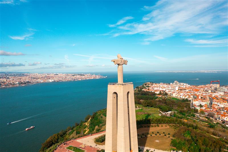Cristo Rei statue Lisbon view over Tagus River and city Portugal