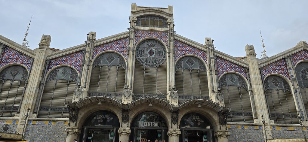 Exterior of Mercado Central in Valencia, Spain, featuring colourful tiles and historic architecture