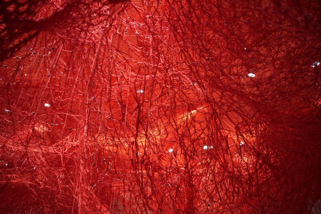 Glowing red installation inside Swarovski Kristallwelten